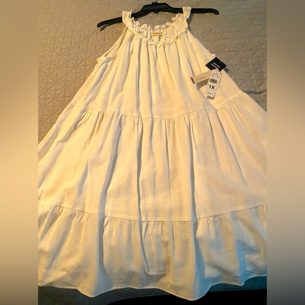 Never worn this beautiful dress.